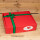 12 Motiv-Wunschäpfel im großen roten Geschenkkarton